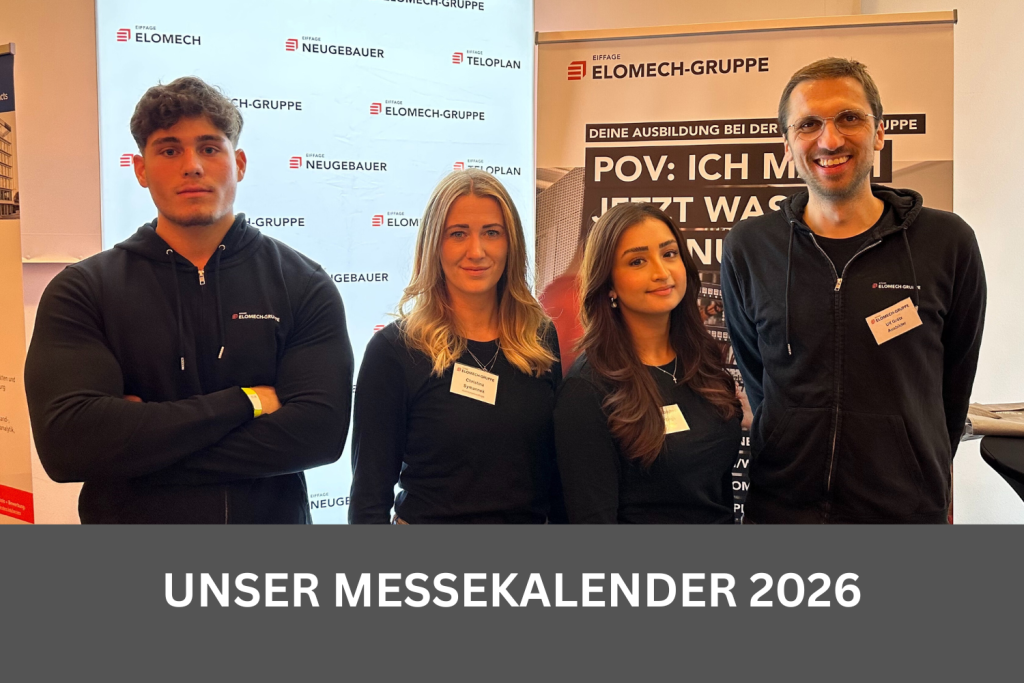 Kollegen und Kolleginnen in Firmenkleidung stehen an einem Messestand. Sie schauen freundlich motiviert und sind offen für deine Fragen rund um den Einstieg bei der ELOMECH-Gruppe.